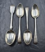 A group of three George III silver Old English pattern spoons, having monograms to terminals,