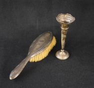 An Elizabeth II silver fluted vase, having a flared Chippendale style rim, raised on a knopped