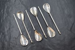 A cased set of Elizabeth II silver Keswick School of Industrial Arts teaspoons, having flattened