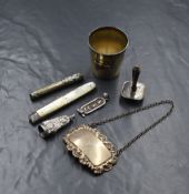 A 20th century silver cigar cutter fob, having chrysanthemums to the body, marked sterling, along