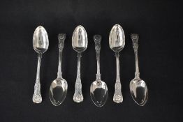 A set of six Victorian silver King's pattern serving spoons, having 'DR' monogram to the