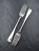 A pair of French silver Hanoverian pattern forks, having 'WNY' monogram to terminals, marks for