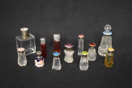 A George V silver and guilloche enamel mounted cut glass scent bottle, the fluted bottle having a