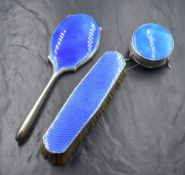 A George V silver guilloche enamel powder pot, of circular form having blue guilloche enamel to