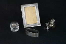 An Elizabeth II silver mounted photograph frame, of plain rectangular form, marks for London 1981,