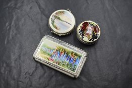 A George V silver and guilloche enamel travel compact, having a painted lake scene with a white