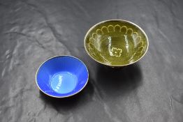 A late Edwardian silver and guilloche pedestal pin dish, having dark green guilloche enamel and gold