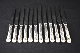 A group of twelve Elizabeth II King's pattern silver handled knives, six large and six small, nine