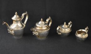 An American silver four piece tea set, comprising coffee, tea, sugar and cream, of circular form