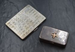 A George VI silver cigarette case, of hinged rectangular form having engine turned decoration and