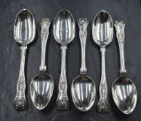 A group of three Victorian silver King's pattern spoons, having heraldic crests to terminals,
