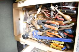 A carton of assorted tools.