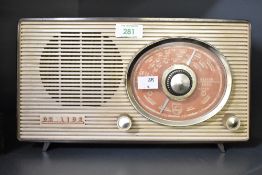 A mid 20th-century Philips 2G04U valve bakelite radio, having a tube/valve that operates on MV and