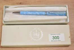 A boxed 20th-century Clarence House ball point pen, of a pale blue with foliated decal, marked to