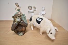 A quantity of 20th-century sundry figurines, to include a large pottery pig; a resin sitting monkey;