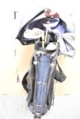 A golf bag and a set of Feel The Fear Z1R Junior golf clubs set including a wood, irons 5/6, 7/8 and