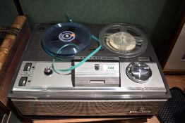 A vintage German Grundig TK 140 de Luxe reel-to-reel tape recorder, featuring a quarter-track mono