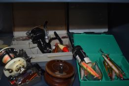 Three vintage fishing reels including a mitchell 602 multiplier and a good selection of lures in