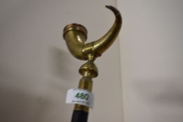 An ebonised walking stick measuring 89cm long with a brass horn snuff box/mull mounted as the
