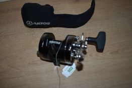 An AKIOS 651 SCM Shuttle multiplier reel in its original soft case