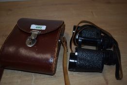 A leather cased set of Karl Zeiss Jena binoculars jenoptem 8x30w