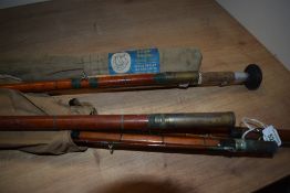 Five vintage cane fishing rods some are in disrepair but this lot includes an Edgar Sealey 3pc