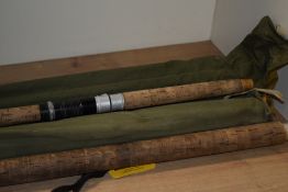 Four vintage fishing rods including an Edgar Sealy Octupus a Bruce and Walker salmon fly rod an