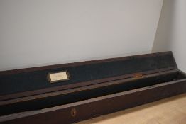 A vintage pine rod box containing two bamboo rods bearing no makers mark the only mark visible is