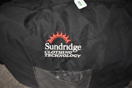 A Sundridge Crossflow 2 piece flotation suit size XL in very good clean condition with its own