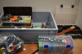 An assortment of fishing tackle including sea and coarse fishing