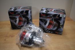A pair of Large Vigor silk 70FD baitrunner spinning reels new in boxes