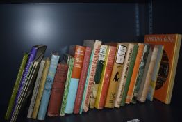 A shelf of shooting and game keeping related books