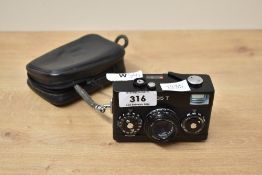 A Rollei 35T camera in black with Tessar 3,5 /40 lens