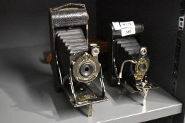 Two Kodak folding cameras. an A1 Pocket Kodak by the Canadian Kadak Co and a No2