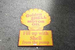 A contemporary reproduction metal and enamel Shell 'Fill up with Shell from the pump' sign, 61cm,