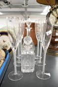 A set of six Millenium Stuart Crystal Ariel long-stem toasting champagne flutes, featuring a tall