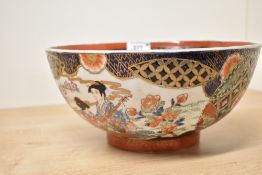 A 20th-century Chinese porcelain charger, featuring two central figures in traditional attire within