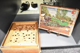 A vintage Swedish Brio Labyrinth game, featuring a wooden board that tilts to guide a steel ball