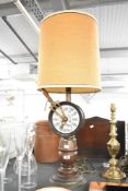 A tall 20th-century reproduction Baldwin-Brocket ships telegraph mounted as a table lamp,