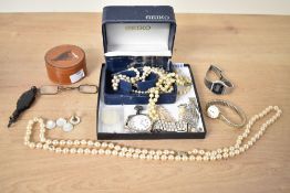 A small collection of costume jewellery, including faux pearls, clip on earrings, mother-of-pearl