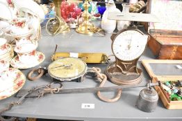 A quantity of 20th-century Salter cast iron weighing apparatus, to include a Salter No.25 parcel/