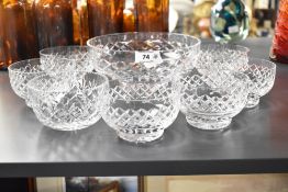 A quantity of 20th-century Stuart Crystal-style cut glass bowls, featuring a diamond-shaped cuts