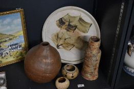 A collection of 20th-century studio pottery and earthenware, to include a large decorative plate