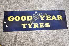 A large contemporary vintage-style enamel and metal Good Year Tyres advertising sign, 31cm x 91.5cm,
