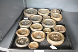 A large assortment of 20th-century iron nesting weights, to include examples from A.K and Sons, C.