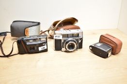 An Agfa camera with Optima Campur shutter and Agfalux flash sells with a Nikon RF camera