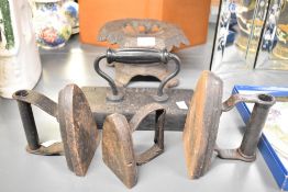 A selection of late 19th-century cast iron ware, to include three flat irons; a large J.Ashcroft and