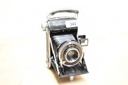 A Welta Perle folding camera circa 1935 with Carl Zeiss Jena Teessar 1:4,5 7.5cm lens and folding