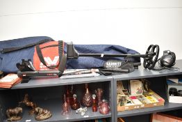 A Minelab E-Trac metal detector, a high-end multi-frequency (1.5–100 kHz) detector, renowned for