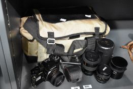 A Yashica FR1 camera with Yashica Ml50mm 1:1,7 lens, a Makinon 1:2,8 135mm lens, an Itorex 1:2,8